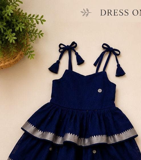 Navy blue tiered tassel dress flat-lay