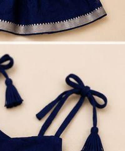 Navy blue tiered tassel dress daisy brooch detail